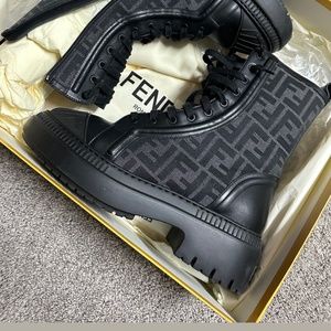 Fendi: Domino Black leather biker boots